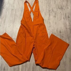 Vibrant Orange Jumpsuit with Cross Back